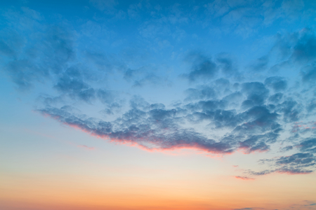 Beautiful colorful Summer sunset beach landscape with stunning sky and colorsの写真素材