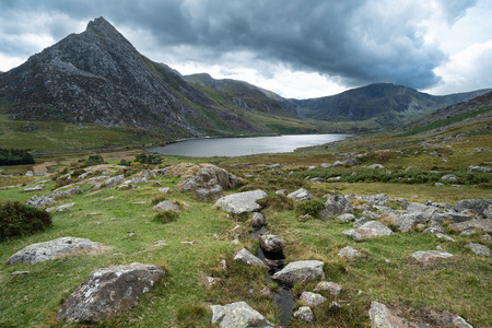 Beautiful landscape image of countryside around Llyn Ogwen in Snowdonia during early Autumn