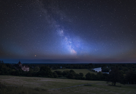 Stunning vibrant Milky Way composite image over landscape of River Thames on Richmond Hill in London.の写真素材