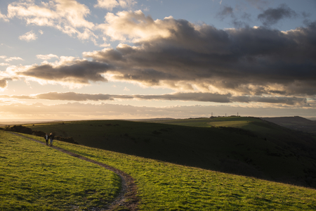 Beautiful Autumn Fall landscape of South Downs National Park in English countryside in late...