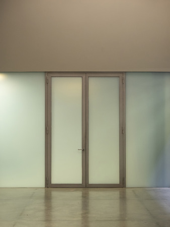 Generic internal glass door and wall panels architectural detail backgroundの写真素材