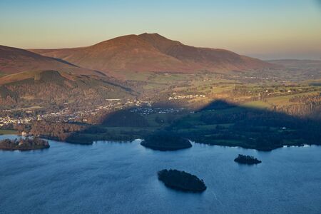 Stunning late afternoon Autumn Fall landscape image of the view from Catbells near Derwent Water in...
