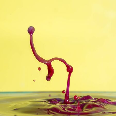 Stunning unique abstract water splash photography images with vibrant colorful water collisions captured using high speed flash techniqueの写真素材