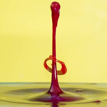 Stunning unique abstract water splash photography images with vibrant colorful water collisions captured using high speed flash techniqueの写真素材