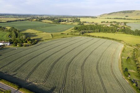 Stunning drone landscape image over lush green Summer English countryside during late afternoon lightの写真素材