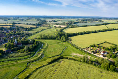 Stunning drone landscape image over lush green Summer English countryside during late afternoon lightの写真素材