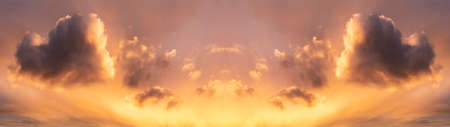 Beautiful Summer sunset sky with heart shaped cloud panorama and colorful vibrant clouds and sun...