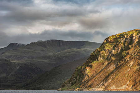 Wonderful landscape image looking across Ennerdale Water in the English Lake District towards the...