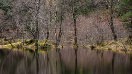 Beautiful landscape image of Torren Lochan in Glencoe in Scottish Highlands on a Winter day