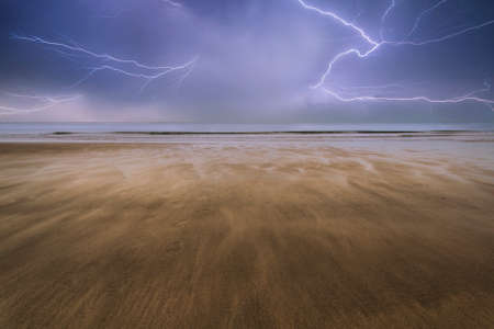 Footprints on empty beach Summer landscape