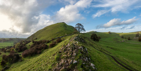 Beautiful landscape image of Chrome Hill in Autumn in Peak District National Park in English countrysideの写真素材
