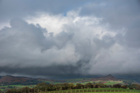 Beautiful wide vista landscape image of English countryside in Peak District National Parkの写真素材