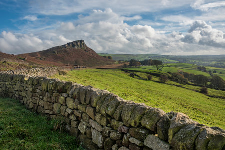 Beautiful wide vista landscape image of English countryside in Peak District National Parkの写真素材