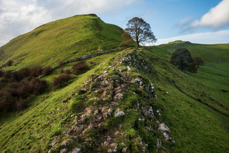Beautiful landscape image of Chrome Hill in Autumn in Peak District National Park in English countrysideの写真素材