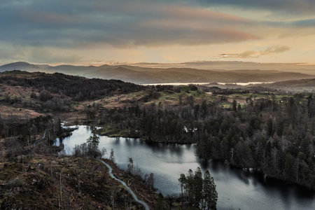 Stunning aerial drone landscape image of Lake District during Spring vibrant sunsetの写真素材