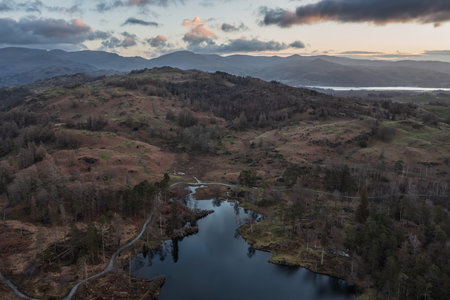 Stunning aerial drone landscape image of Lake District during Spring vibrant sunsetの写真素材