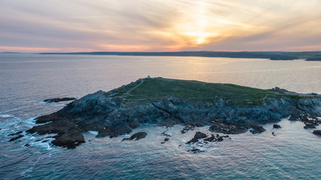 Stunning aerial drone landscape image of Towan Headland in Cornwall during beautiful Summer morningの写真素材