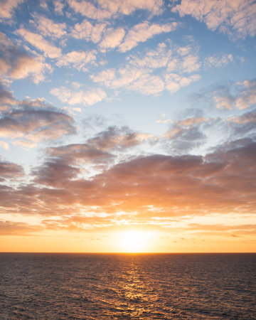 Stunning Summer sunset landscape image of Pentire Headland in Cornwall England with dramatic skyの写真素材