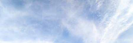 Panorama blue sky background with tiny clouds.の写真素材