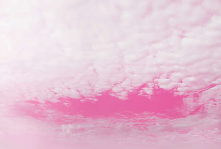 Light pink sky background with full of clouds