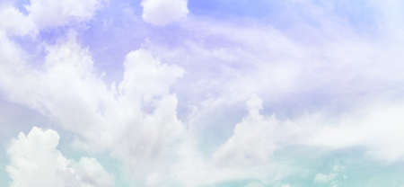 panorama blue sky background with white cloud.Fantasy cloudy sky with pastel gradient color, nature abstract image use for background.の写真素材