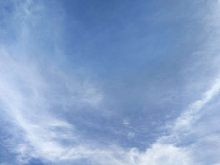 blue sky background with tiny clouds.の写真素材