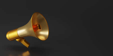 Gold megaphone isolate on black background with copy space for texts. Loudspeaker on dark...