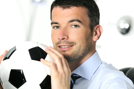 Business man with footballの写真素材