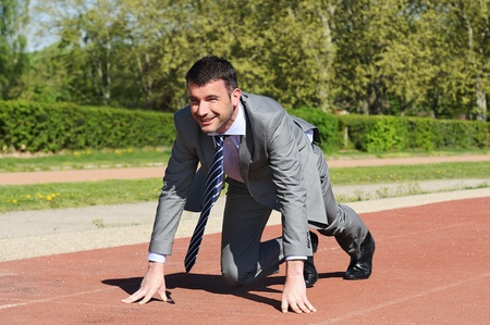 Portrait of a businessman on the starting blocksの写真素材