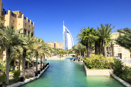 View at hotel Burj al Arab from Madinat Jumeirah in Dubai  Madinat Jumeirah encompasses two hotels and clusters of 29 traditional Arabic houses  United Arabe Emiratesのeditorial素材