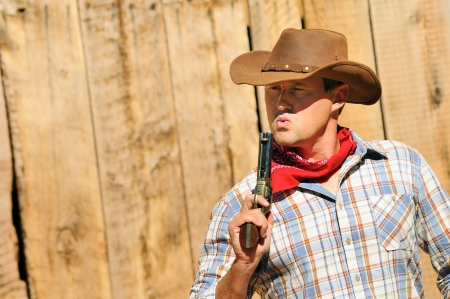 OUT WEST - A cowboy takes time to rest and reflect. 
