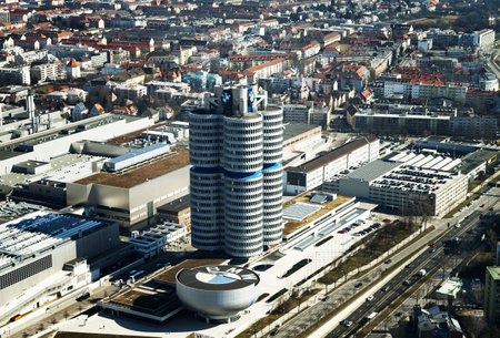 MUNICH, GERMANY - JANUARY 5: BMW Headquarters on March 10, 2015. The four vertical cylinders building is a Munich landmark which is world headquarters for the Bavarian automaker.のeditorial素材