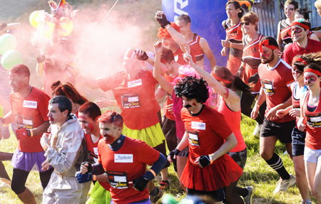 LYON, FRANCE - MAY 24: Crazy group of sportive people all are dressd,  Frappadingue race participating in the event in the Miribel Jonage Park to Lyon on May 25, 2015. People from all walks of life participated in the run.のeditorial素材