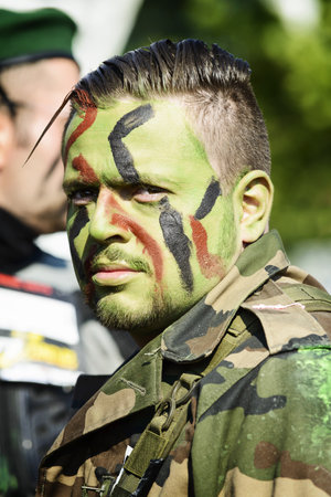 LYON, FRANCE - MAY 24: A man dressed in military commando,  Frappadingue race participating in the...