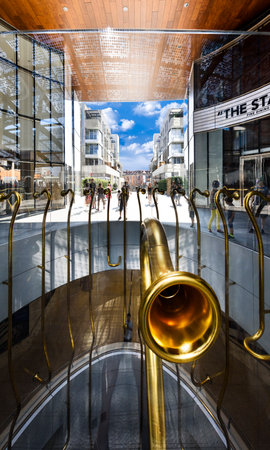 MILAN , LOMBARDIE,  ITALY - AUGUST 30 2015 : Porta Nuova, the Golden Trumpets Installation by Garuttiのeditorial素材