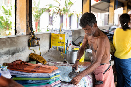 Cochin, kerala, India : December 25, 2018 : Mens are working in a laundry in Cochin Kerala Indiaのeditorial素材