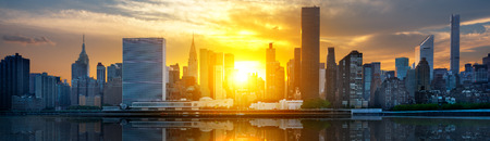New York City skyline with urban skyscrapers at sunset, USA.の写真素材