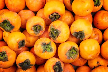 persimmon fruit as background
