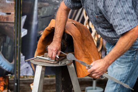 blacksmith gesture on his anvil