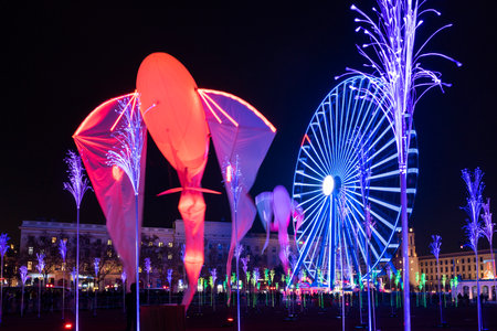 December 04, 2019 Lyon, France : One day day before the Lights event in Lyon, Place Bellecour. Intermittents and preparations for the festival of lights which takes place on 5, 6, 7 and 8 December 2019 in Lyon, France. In the background, the Fourviere hilのeditorial素材