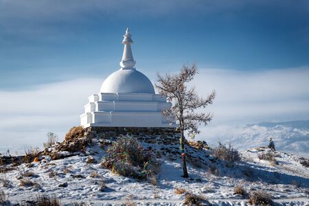 Ogoy Island, Baikal Lake, Russia- White Buddhist stupa and the baikal lakeの写真素材
