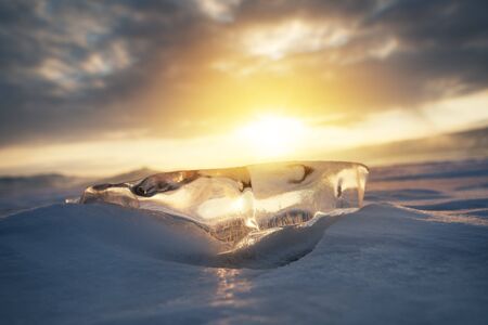Natural breaking ice over frozen water lake, Baikal Russia winter season natural landscape backgroundの写真素材