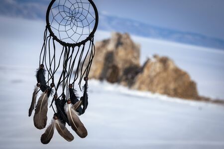 Shamanic ritual on the Olkhon Island on the Baikal lake, in Russia. View of the sacred and chamanic rocの写真素材