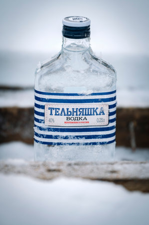 march 05, 2020, davsha village, Siberia, Russia: Bottle of Vodka near the Baikal lake in Siberia, Russiaのeditorial素材