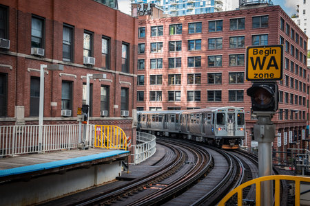 Chicago: October 11, 2018, Train on elevated tracks within buildings at the Loop, Glass and Steel...