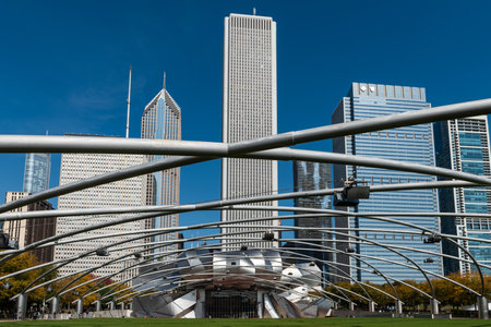 October 14, 2018, Millenium park, Chicago, Illinois, USA: famous entrance of the millenium park in the center of Chicago city with the skyline of downtownのeditorial素材