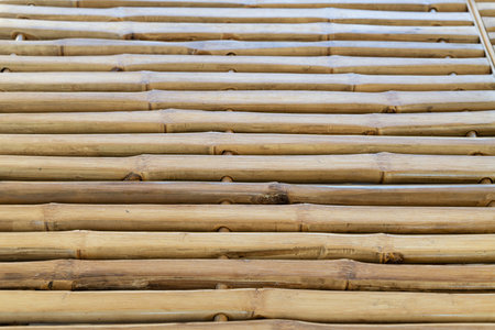 NATURAL MATERIAL MADE OF BAMBOO AS ABACKGROUNDの写真素材