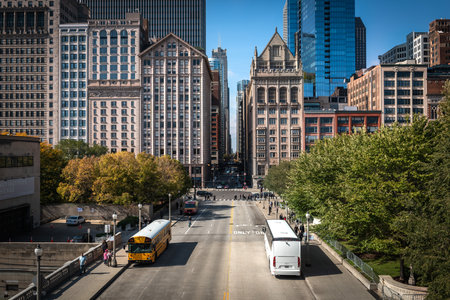 Traffic in downtown Chicago with people, trains, cars and busesのeditorial素材
