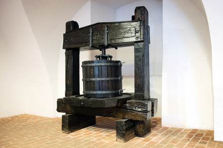 Traditional old technique of wine making, wooden antique grape pressの写真素材