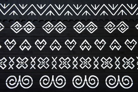 painted pattern on side of log house in Cicmany, UNESCO World Heritage Site, Slovakia